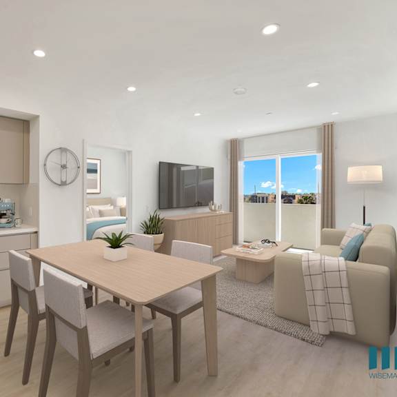 a modern kitchen with a dining table and chairs.