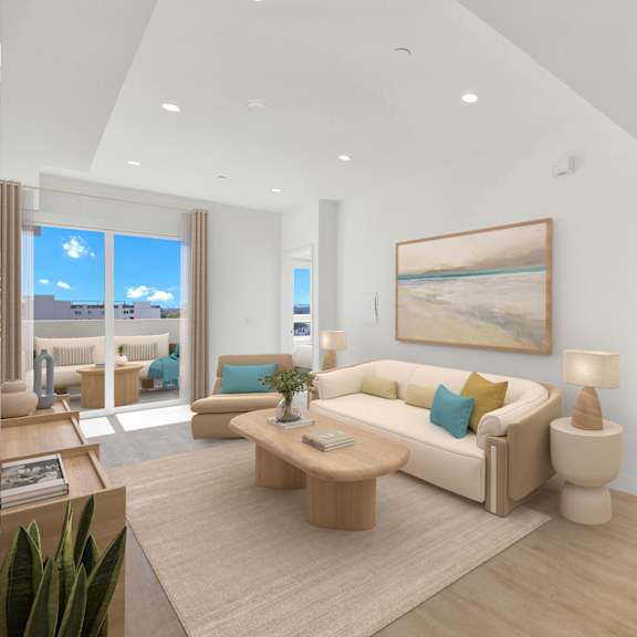 a modern living room with a large painting on the wall and a coffee table in the center.