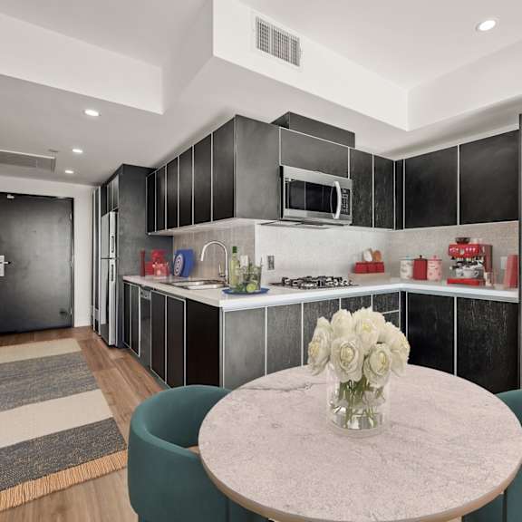 kitchen and dining area with cabinet storage at ogden garden by wiseman, california, 90036