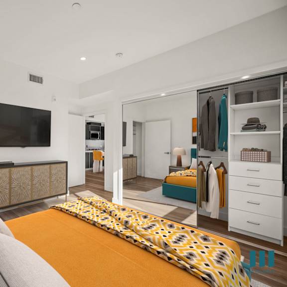 bedroom with a multiple closets at ogden garden by wiseman, los angeles, ca, 90036