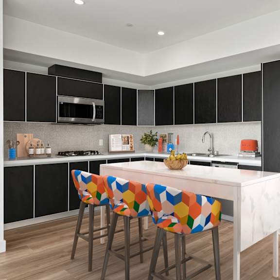 kitchen with a refrigerator at ogden garden by wiseman, los angeles, ca, 90036