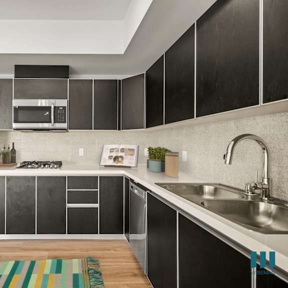 kitchen with dishwasher at ogden garden by wiseman, los angeles, california
