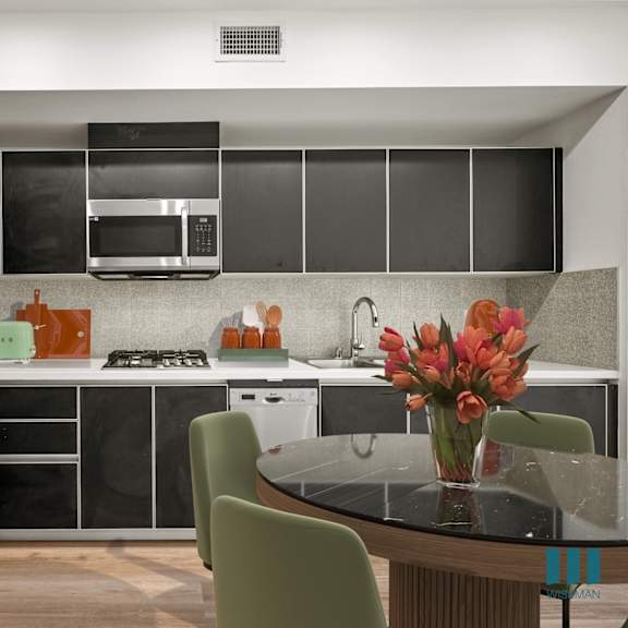 kitchen with ample cabinet storage at ogden garden by wiseman, los angeles, ca