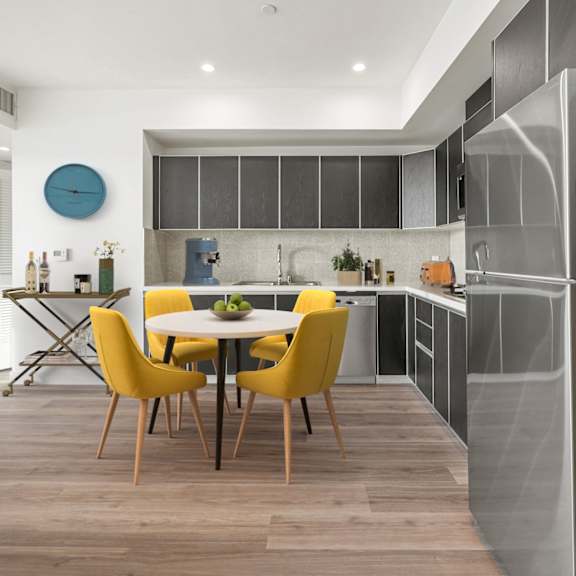 kitchen with yellow chairs at ogden garden by wiseman, los angeles, 90036