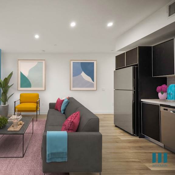 living room with grey couch at ogden garden by wiseman, los angeles, 90036