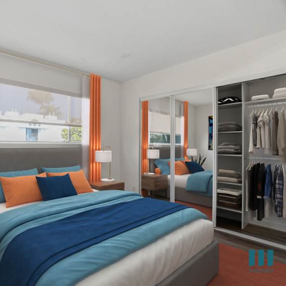 bedroom with vinyl flooring and large mirrored closet with shelving