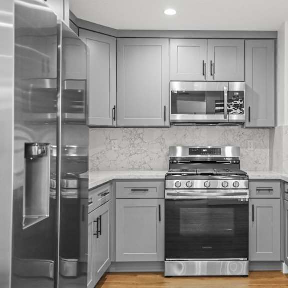 kitchen with energy-efficient appliances and ample cabinet storage
