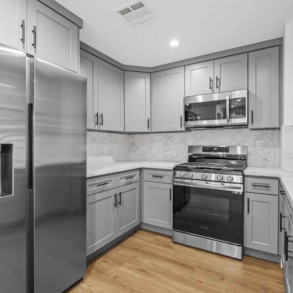 kitchen with stainless-steel refrigerator, stove, microwave oven, and dishwasher