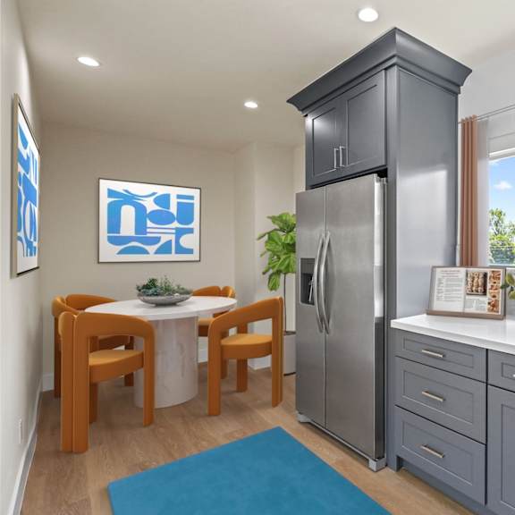 kitchen with stainless-steel appliances and dining area