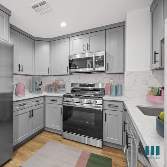 kitchen with stainless-steel refrigerator, stove, microwave oven, and dishwasher