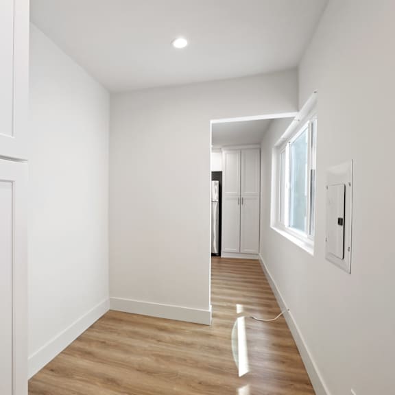 large studio apartment with cabinet storage