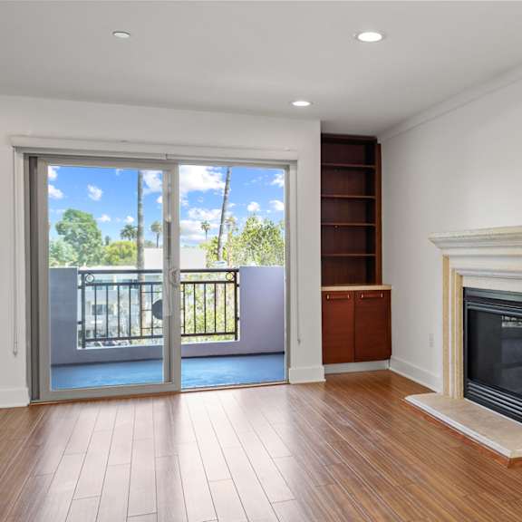 living room spaces with bar and fireplace