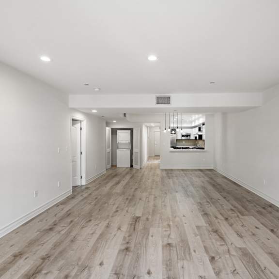 open-concept kitchen, dining, and living room