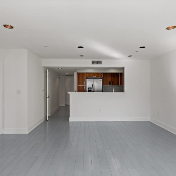open-concept living, dining, and kitchen areas