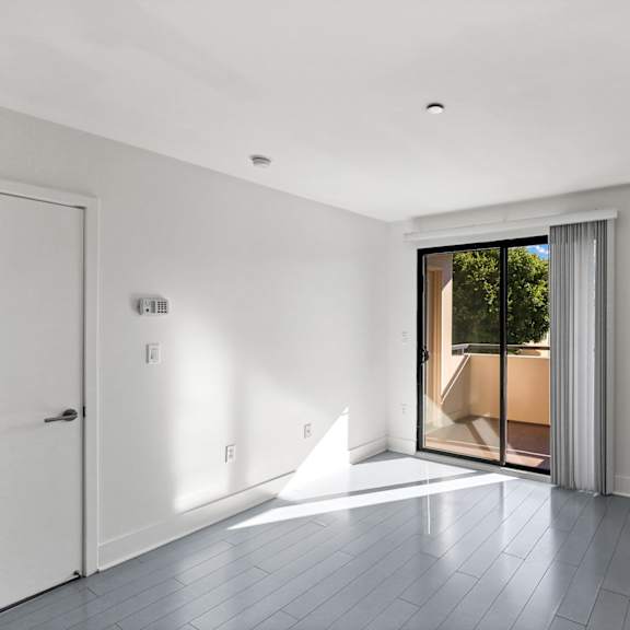 bedroom with balcony access