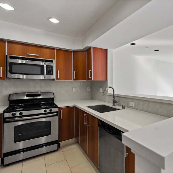 open-concept kitchen, dining, and living room space
