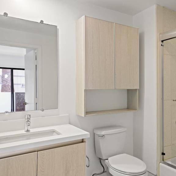 bathroom with full-size bathtub