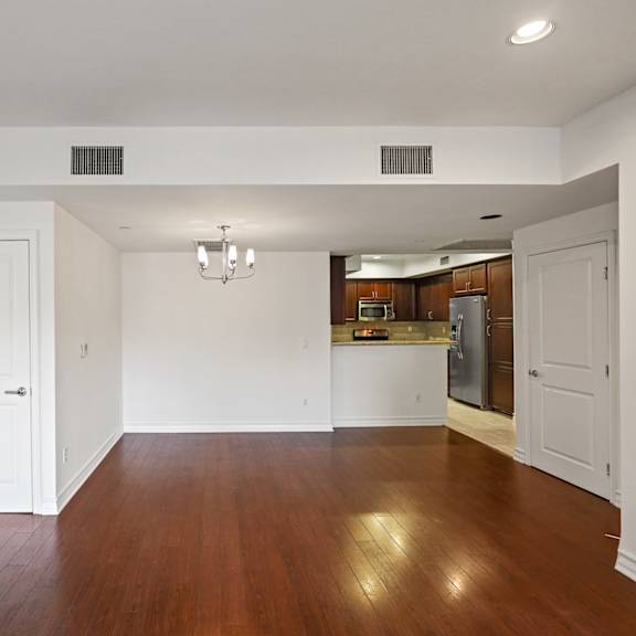 open-concept kitchen, dining, and living room areas