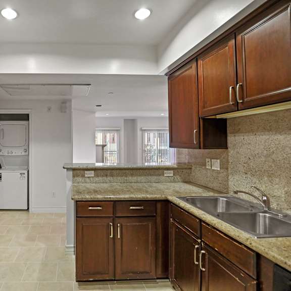 kitchens with energy-efficient stainless appliances and in-suite washer & dryer