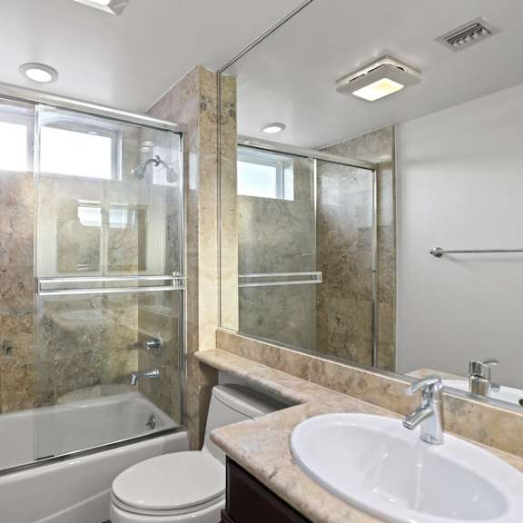 bathroom with full-size bathtub