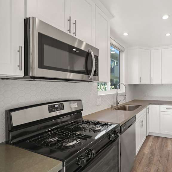 apartment full-size kitchen with lots of cabinet storage