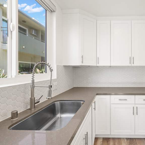apartment with full-size kitchen with energy-efficient appliances
