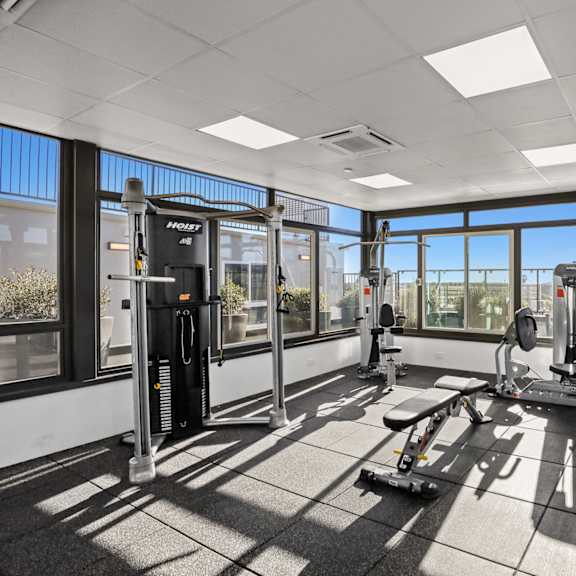 rooftop gym with views of the city
