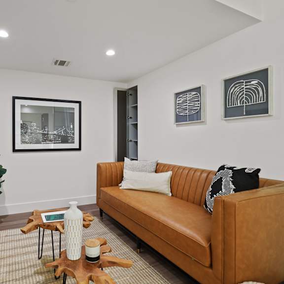 living rooms with vinyl flooring and recessed lighting