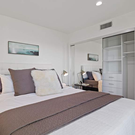 bedrooms with large-size closets with built-in organizers