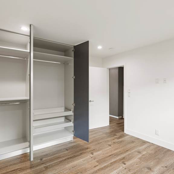 bedroom with lots of cabinet storage