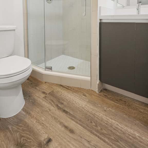 bathroom with stand-in shower and glass door