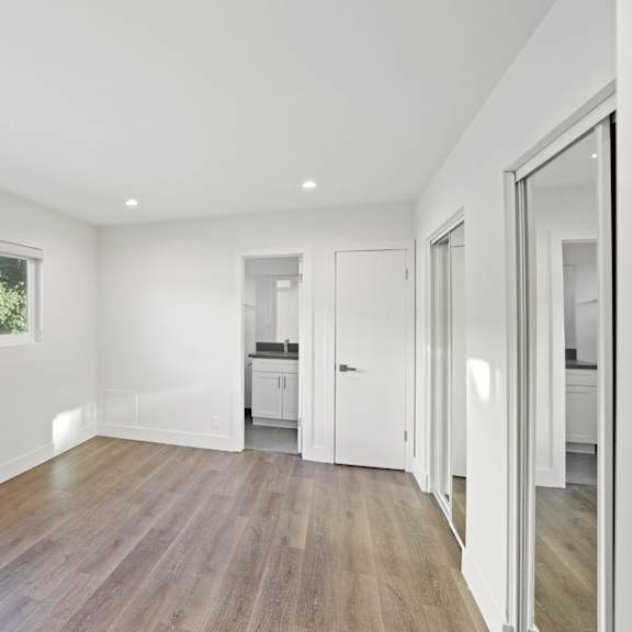 large bedrooms with full-size mirrored closets