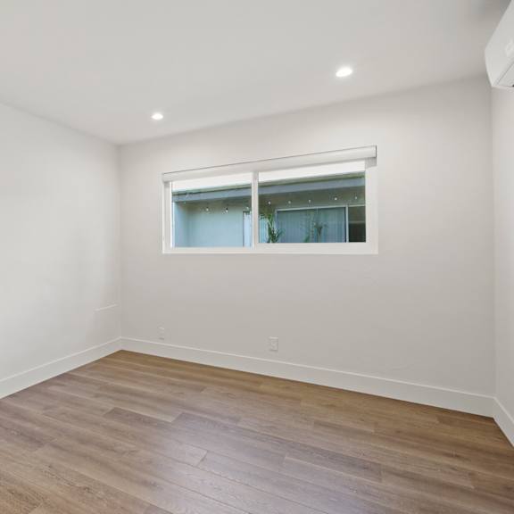 bedroom space with recessed lighting