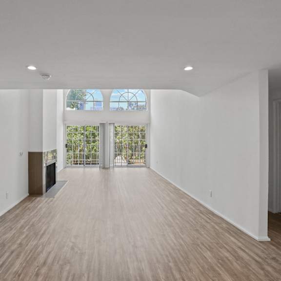 west la apartment large living rooms with natural light and fireplaces
