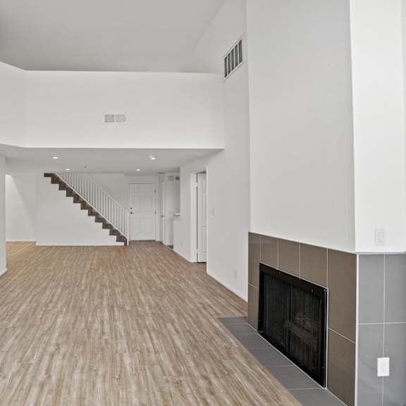 west la apartment with fireplace  and vinyl flooring