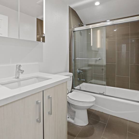 west la apartment with bathroom with full-size bathtub