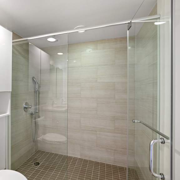 full-size bathroom with walk-in shower