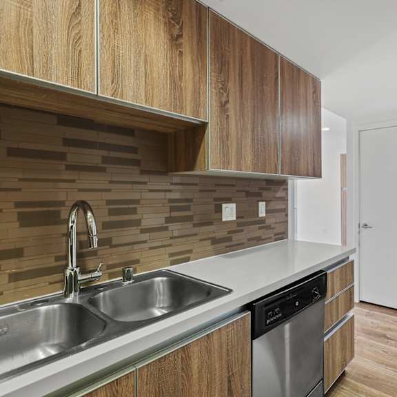full-size kitchen with energy-efficient appliances and ample cabinet storage