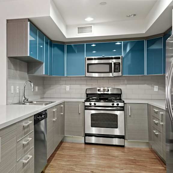 full-size kitchen with ample cabinet storage and energy-efficient appliances