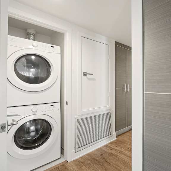 in-suite full-size washer & dryer and large size cabinet storage