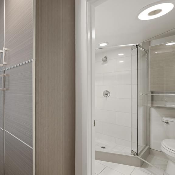 apartment bathroom and cabinet storage space