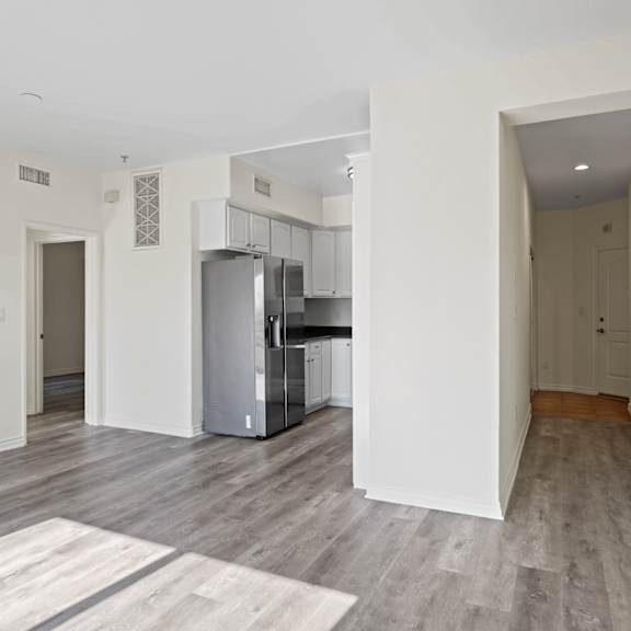 dining and living room space with new vinyl flooring