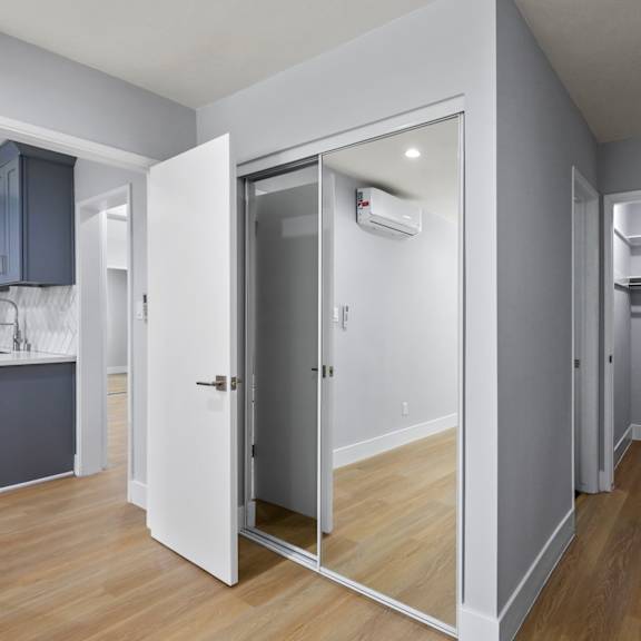 bedroom with two closets