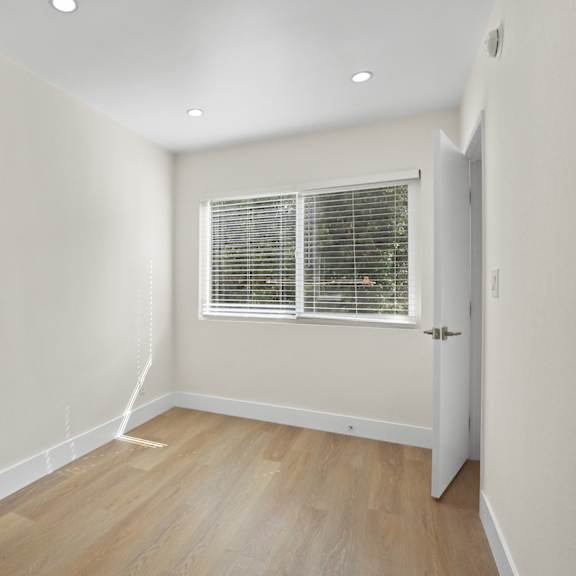 bedroom with window and natural light