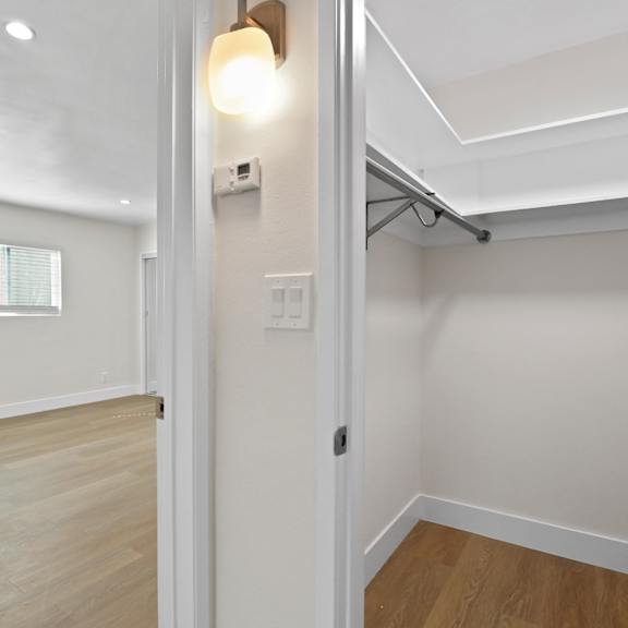 walk-in closet with built-in shelving