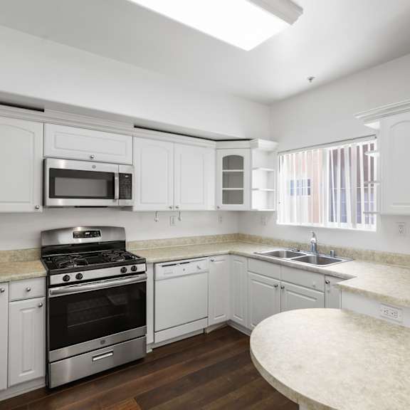 kitchen with energy-efficient stove and microwave oven