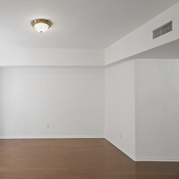 living room with vinyl flooring and windows