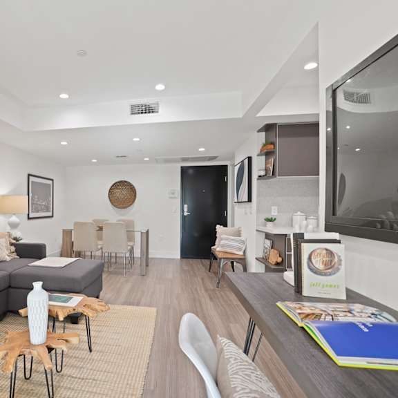 open-concept living, dining, and kitchen space