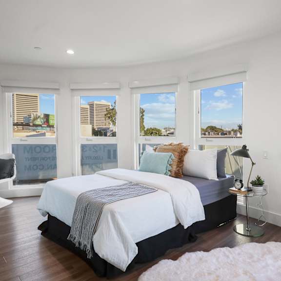spacious master suite with large windows