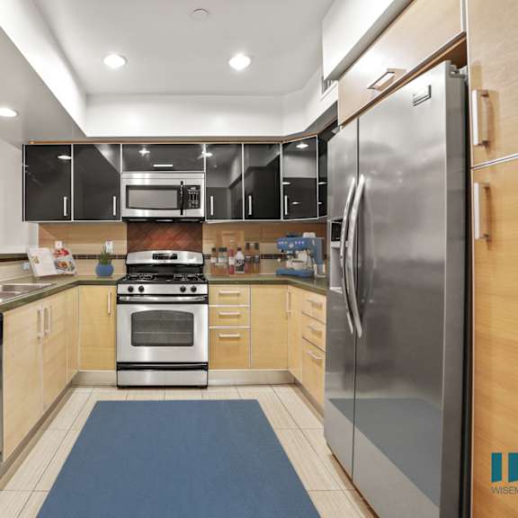 full-size kitchen with energy-effcient appliances and ample cabinet storage